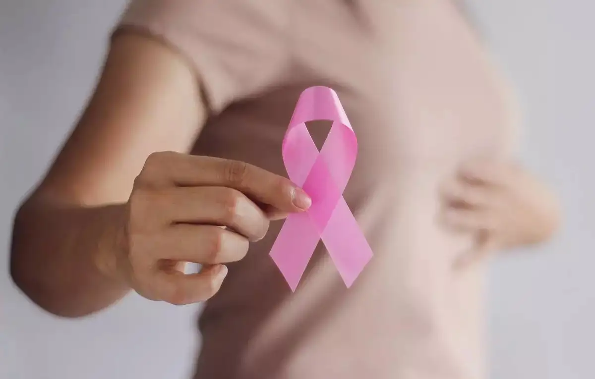 Woman Holding Pink Ribbon
